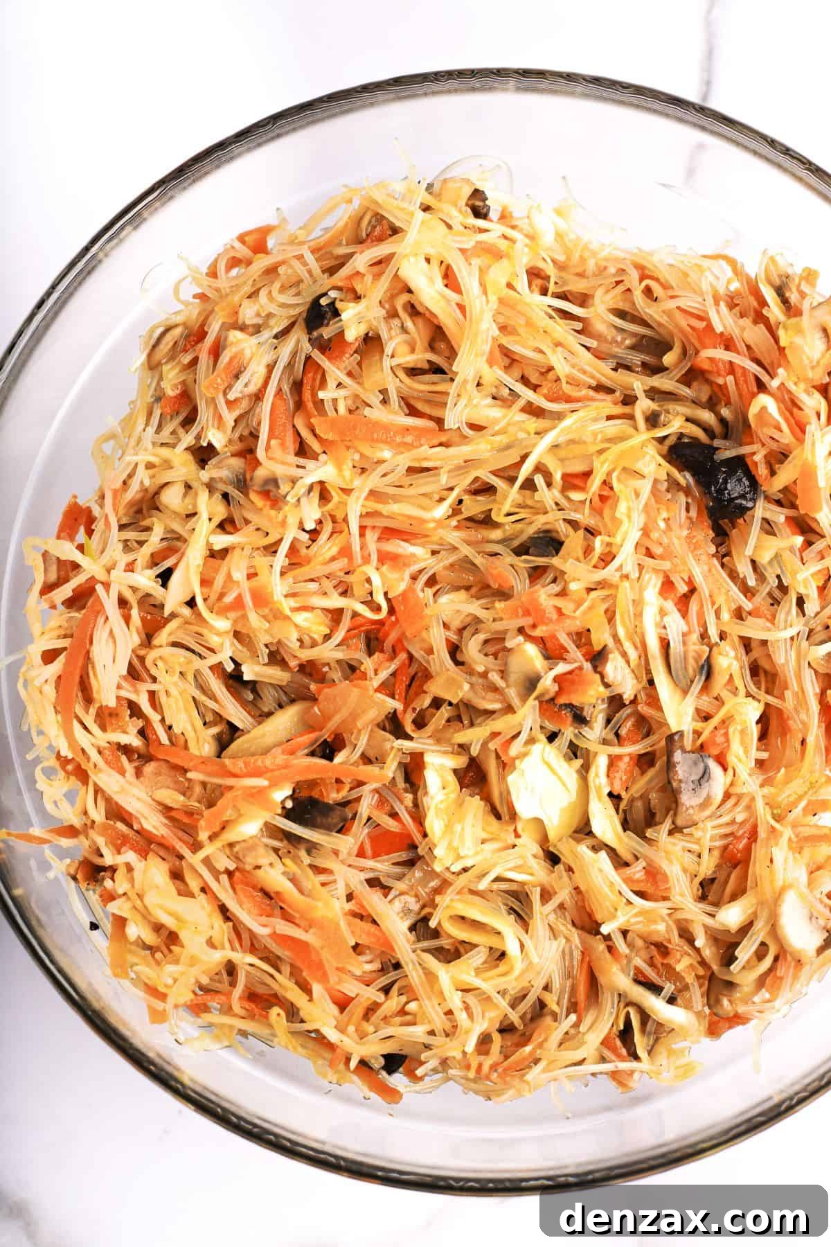 Crispy Golden Vegetable Spring Rolls Recipe 4 A bowl of spring roll filling, made with rice vermicelli, carrots, mushrooms, and more.