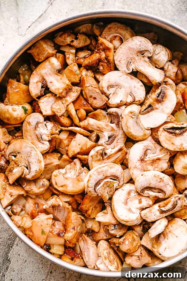 Mushrooms sauteing in a pan