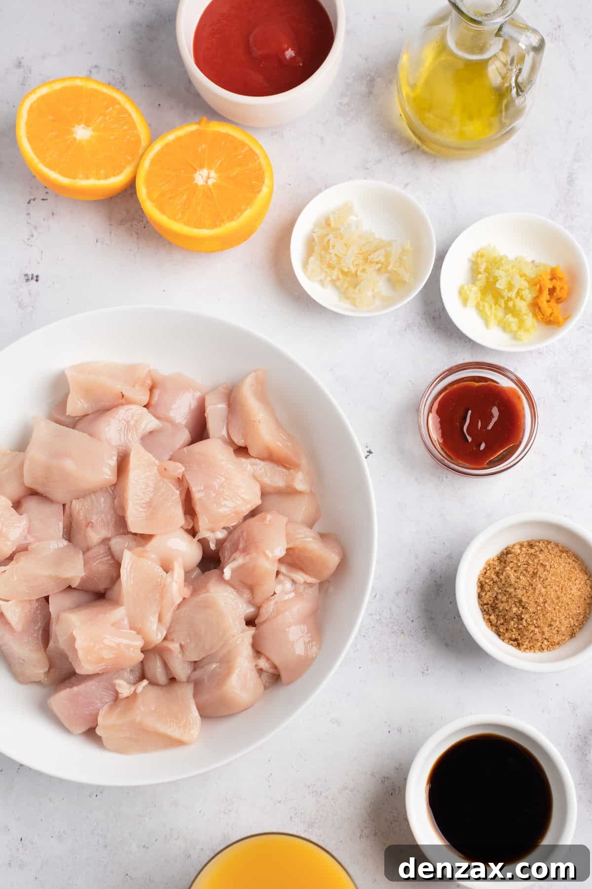 Instant Pot Orange Chicken Recipe: Sticky, Tangy Weeknight Meal 3 Clockwise from top: Tomato paste, oil, grated ginger, minced garlic and orange zest, sriracha sauce, soy sauce, orange juice, chicken