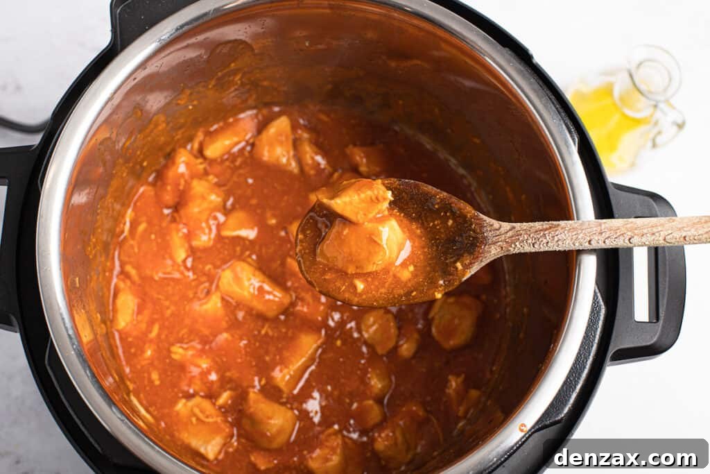 Instant Pot Orange Chicken Recipe: Sticky, Tangy Weeknight Meal 7 Orange chicken with the sauce thickened.