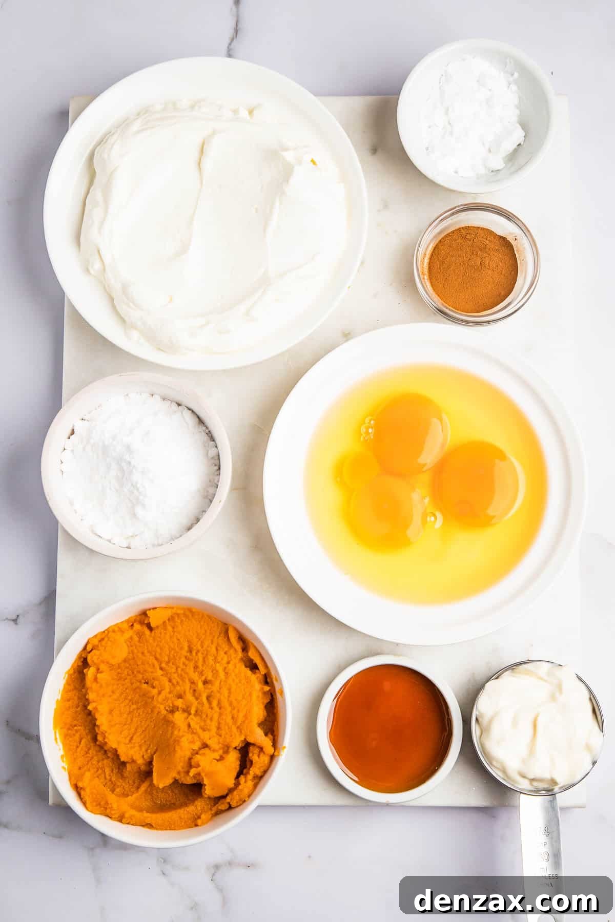 overhead shot of bowls with ingredients for instant pot pumpkin cheesecake