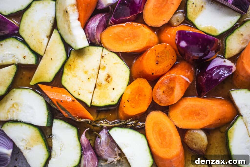 Roasted Pork Chops with Apples and Winter Vegetables 5 Vegetables in a roasting pan.