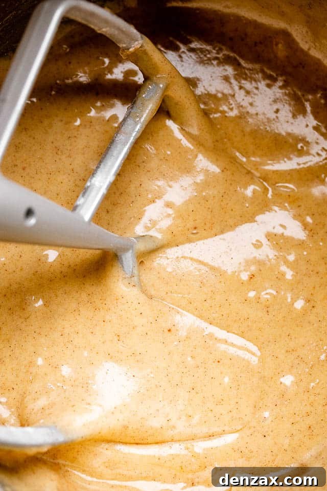 Mixing carrot cake batter.