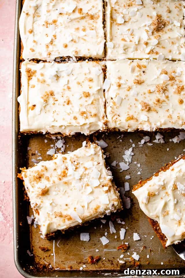 frosted carrot cake in a sheet pan