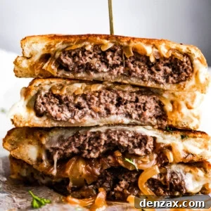 patty melt sandwich cut in halves and stacked up.