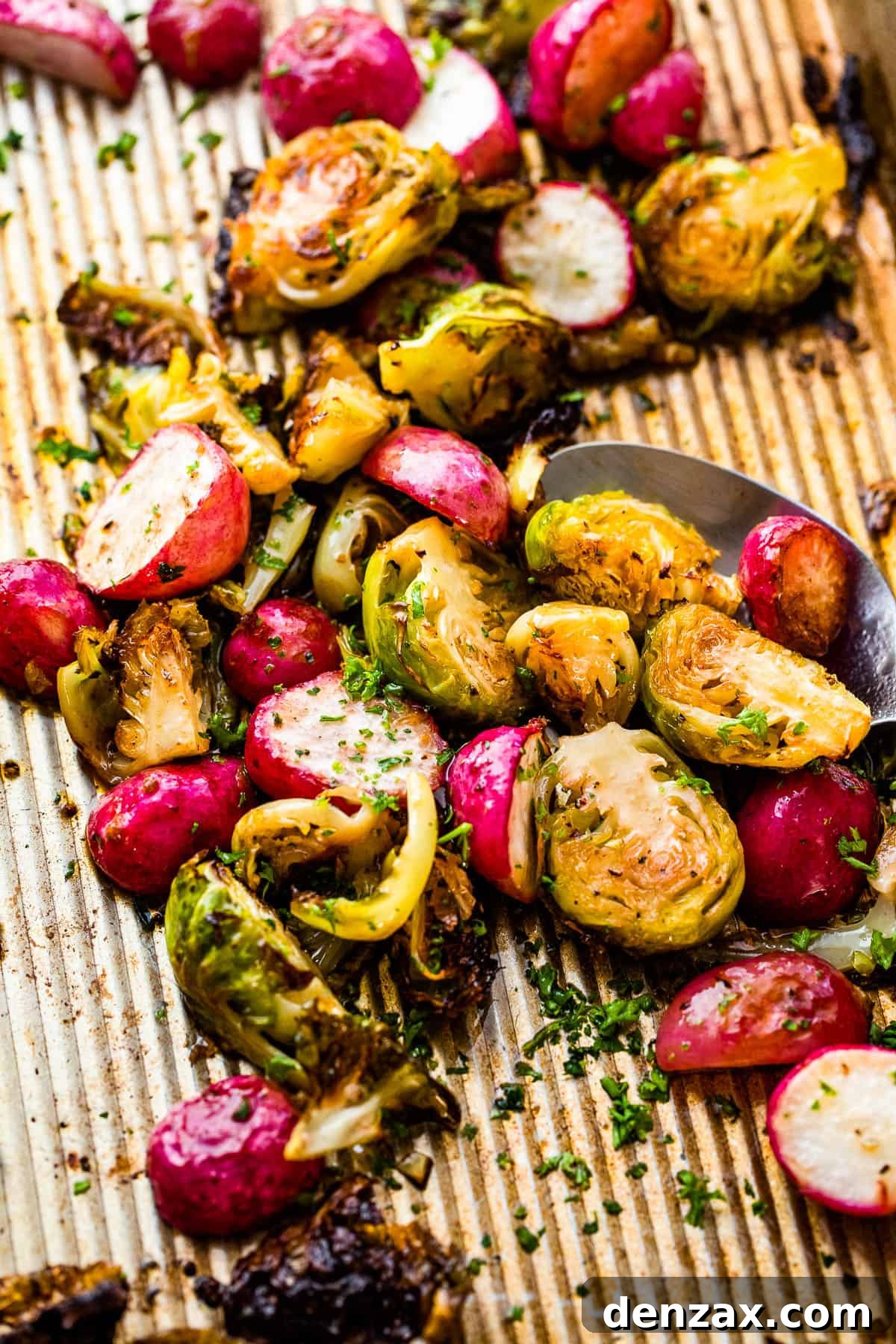 Crispy Roasted Brussels Sprouts with Caramelized Radishes 5 overhead shot of halved Roasted Brussels Sprouts and Radishes on a baking sheet